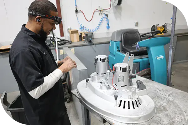 technician working on scrubber deck